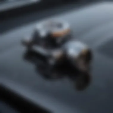 A close-up of the convertible's soft-top mechanism demonstrating engineering design