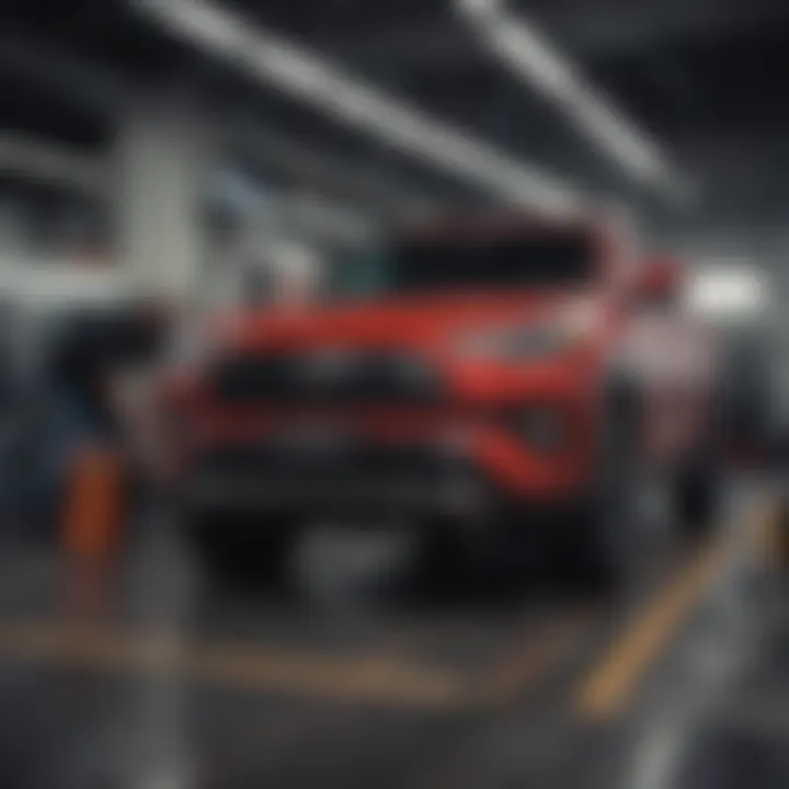 Service technicians performing maintenance on a Toyota vehicle in the dealership's service bay.