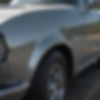 Close-up of a car fender showcasing different materials used