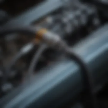 Close-up of a throttle cable installation in a classic Chevelle