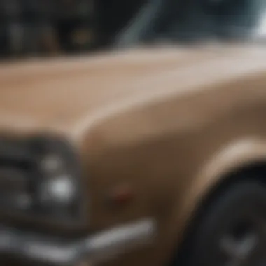 Close-up of a car surface being stripped of old paint