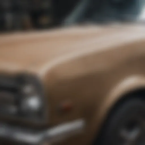 Close-up of a car surface being stripped of old paint