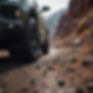 Dean Tires in Action on Challenging Terrain An automobile equipped with Dean Tires driving on a rugged terrain.