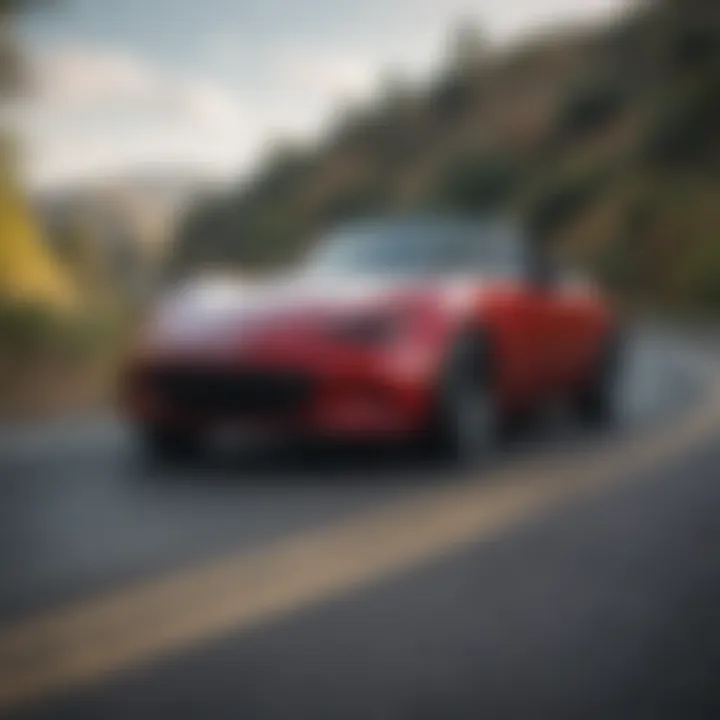 Mazda Miata on a winding road, illustrating its performance capabilities