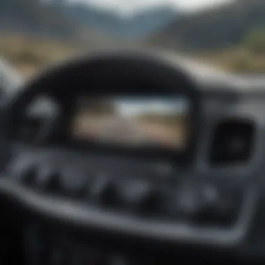 A close-up view of an SUV's advanced technology dashboard showing navigation and off-road settings.