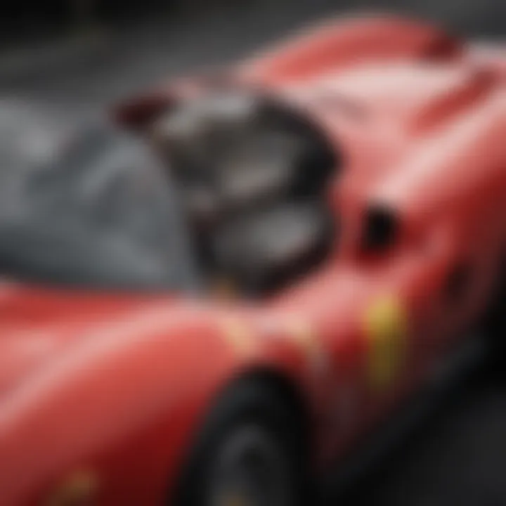 Historic Ferrari racing car with a prominent engine view