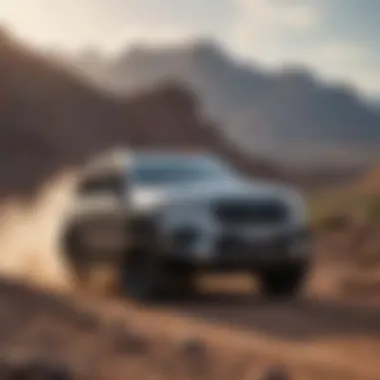 Geolandar AT tire mounted on an SUV navigating rocky terrain
