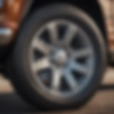 Close-up shot of Jeep Grand Wagoneer wheels, illustrating its powerful stance and rugged capability