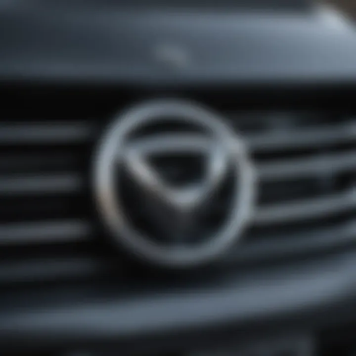 Mazda vehicles displaying the iconic emblem on the front grille