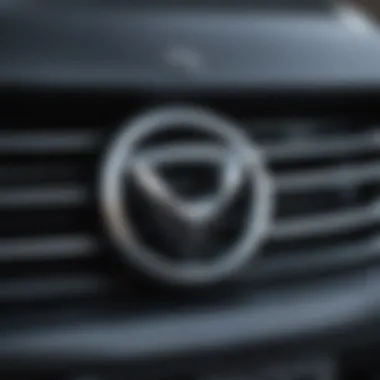 Mazda Emblem on Vehicle Grilles Mazda vehicles displaying the iconic emblem on the front grille