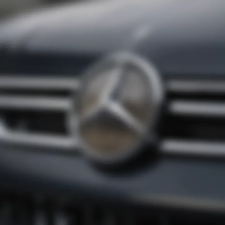 A freshly replaced Mercedes Benz emblem on a vehicle