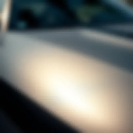 Close-up of matte car paint reflecting sunlight