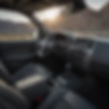 Interior view of the Nissan Frontier Crew Cab highlighting technology features