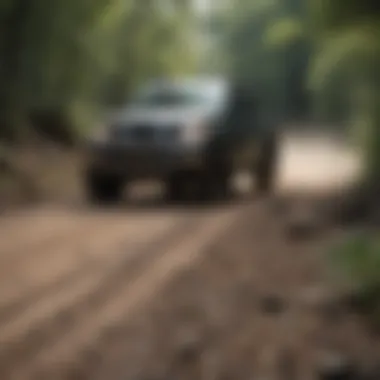 Nissan Frontier driving on an off-road trail