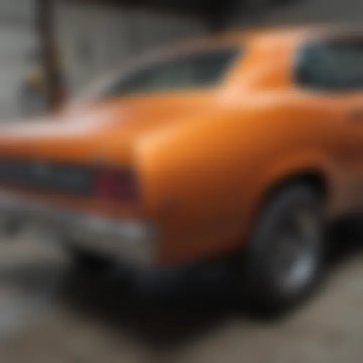 Restoration techniques applied to a Plymouth Duster quarter panel in a workshop setting