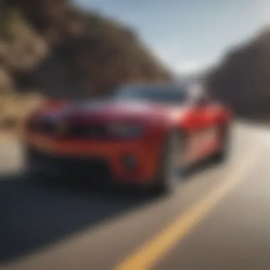 Chevrolet Camaro in motion on a winding road, illustrating its performance dynamics