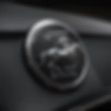 Close-Up of Black Mustang Emblem Close-up of the black Mustang's emblem highlighting its iconic status.
