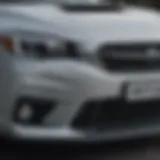 Front view showcasing the Subaru Impreza's dynamic grille and sleek headlights