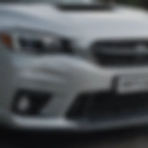 Front view showcasing the Subaru Impreza's dynamic grille and sleek headlights