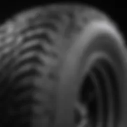Close-up view of the tread design of the Toyo Open Country MT tire showcasing its robust features
