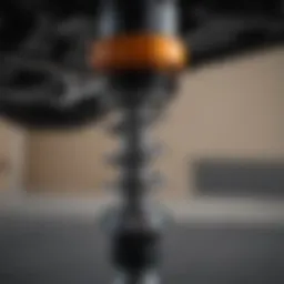 Close-up view of a coilover suspension system installed on a 4x4 vehicle