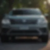 Front view of the VW Atlas Sport showcasing its bold grille and sleek headlights