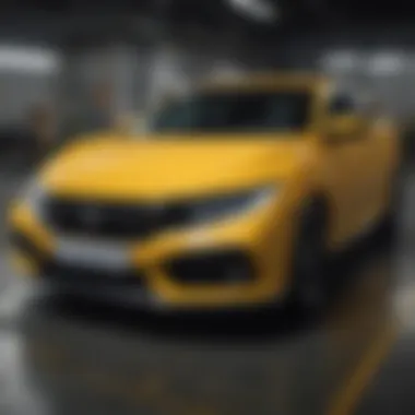 Interior dashboard of the yellow Honda Civic hatchback highlighting technological features